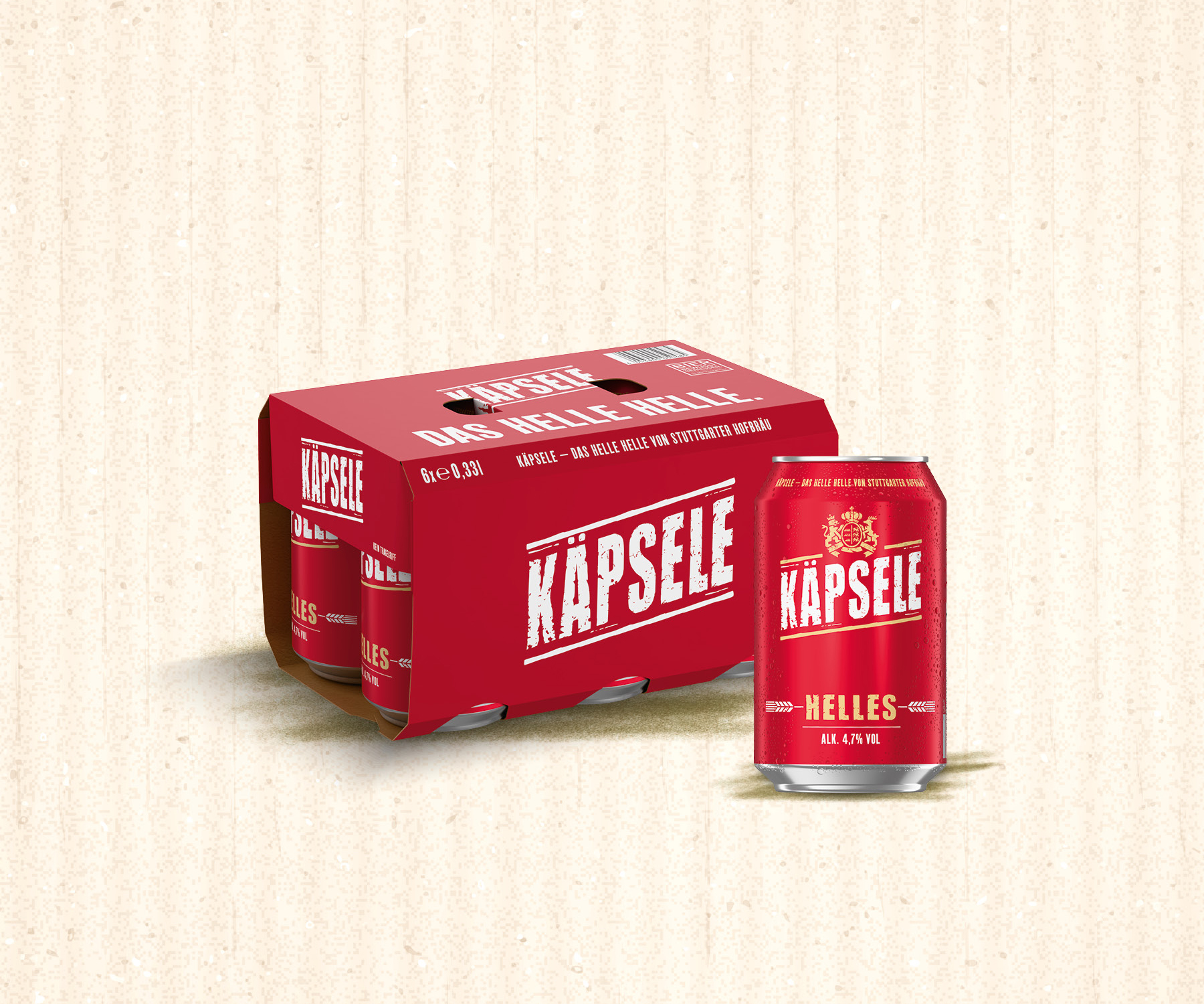 Eine rote 0,33 Liter Dose mit der Aufschrift Käpsele steht neben einem Sechserpack mit der selben Gestaltung.